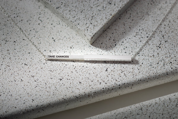 Take Chances Hidden Affirmation Message Necklace In Silver Finish by My Focus Jewelry